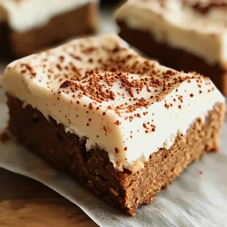 Chewy Gingerbread Cookie Bars with Spiced Cream Cheese Frosting